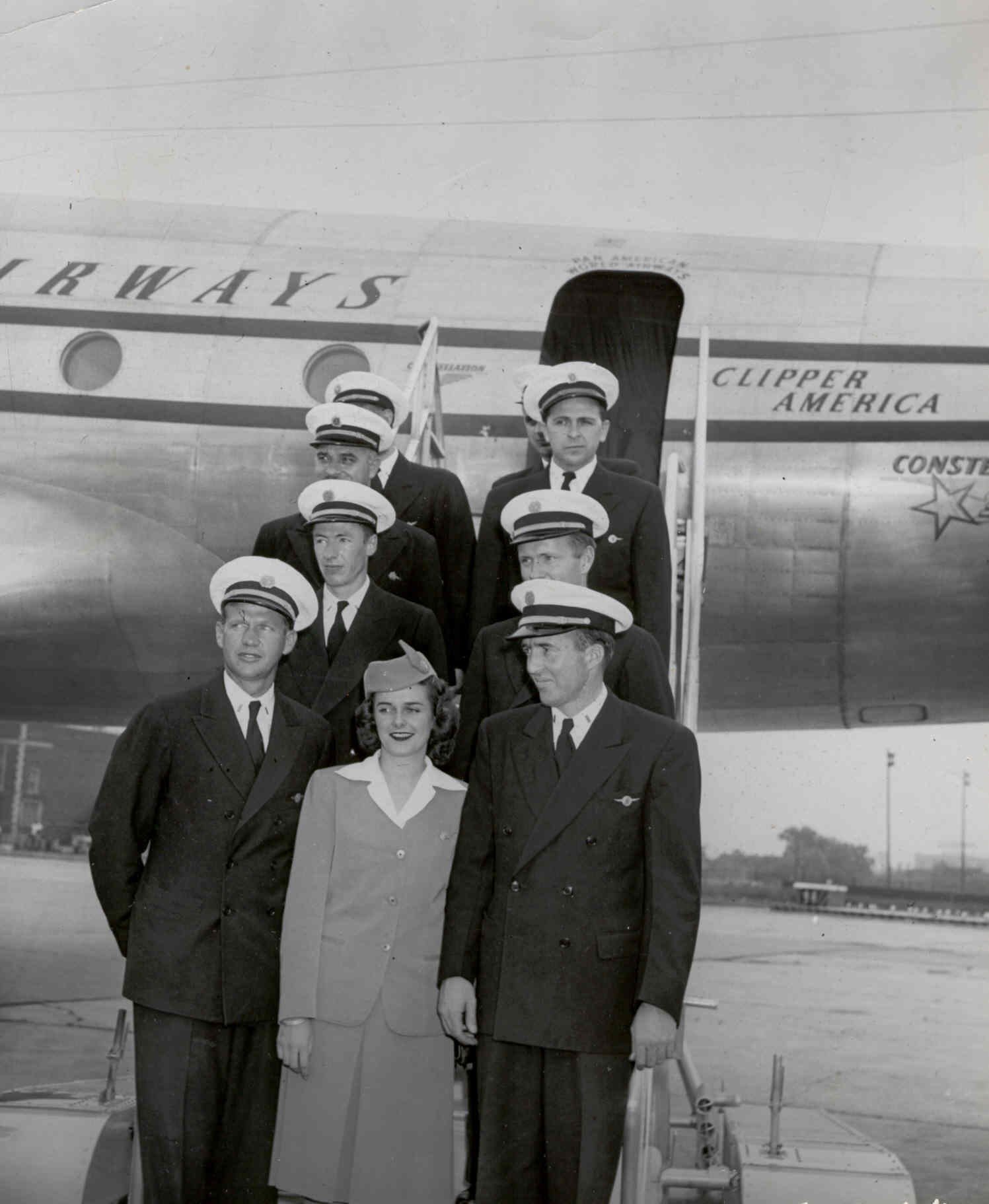 1940s A Pan Am crew pose on the steps of a Lockheed Constellation.